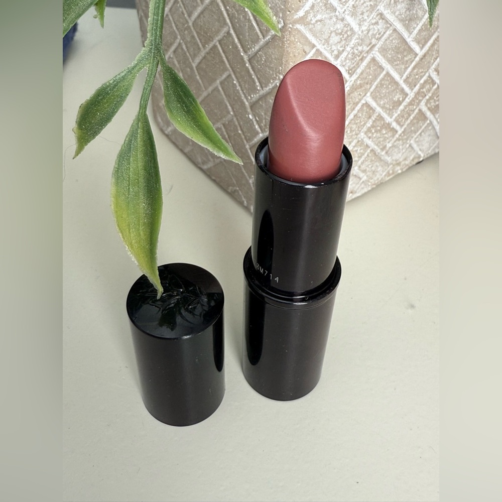 Lancome color design lipstick in color Trendy Muave. Difficult to find